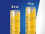 Bebida energética Red Bull, tropical, edición amarilla, 12 onzas líquidas (paquete de 24) - фото 1