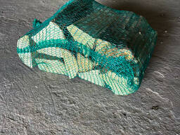 Firewood in plastic nets | Wholesale | Worldwide delivery | Ultima